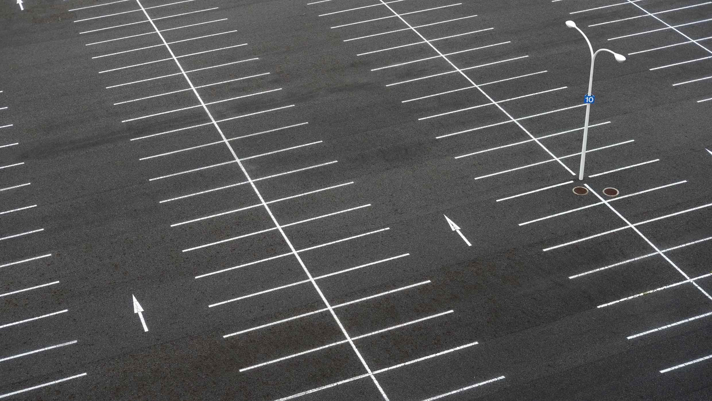 How to pick a PSD company - empty parking lot with arrows