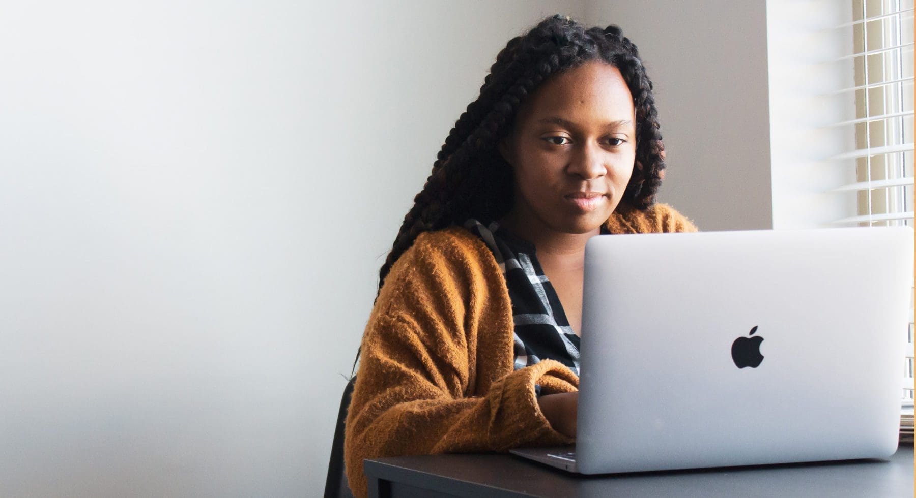 a woman using a laptop
