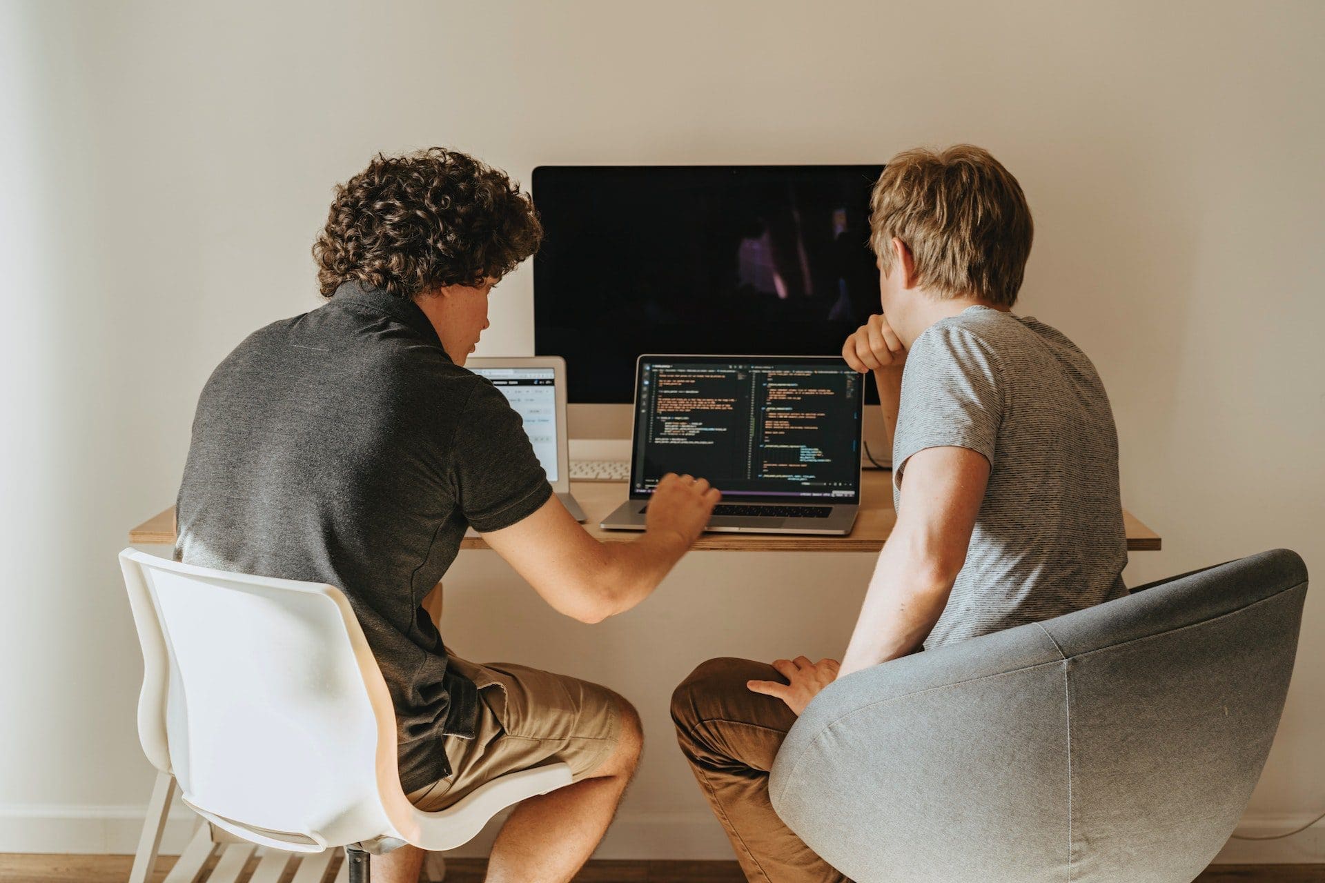 2 persons coding