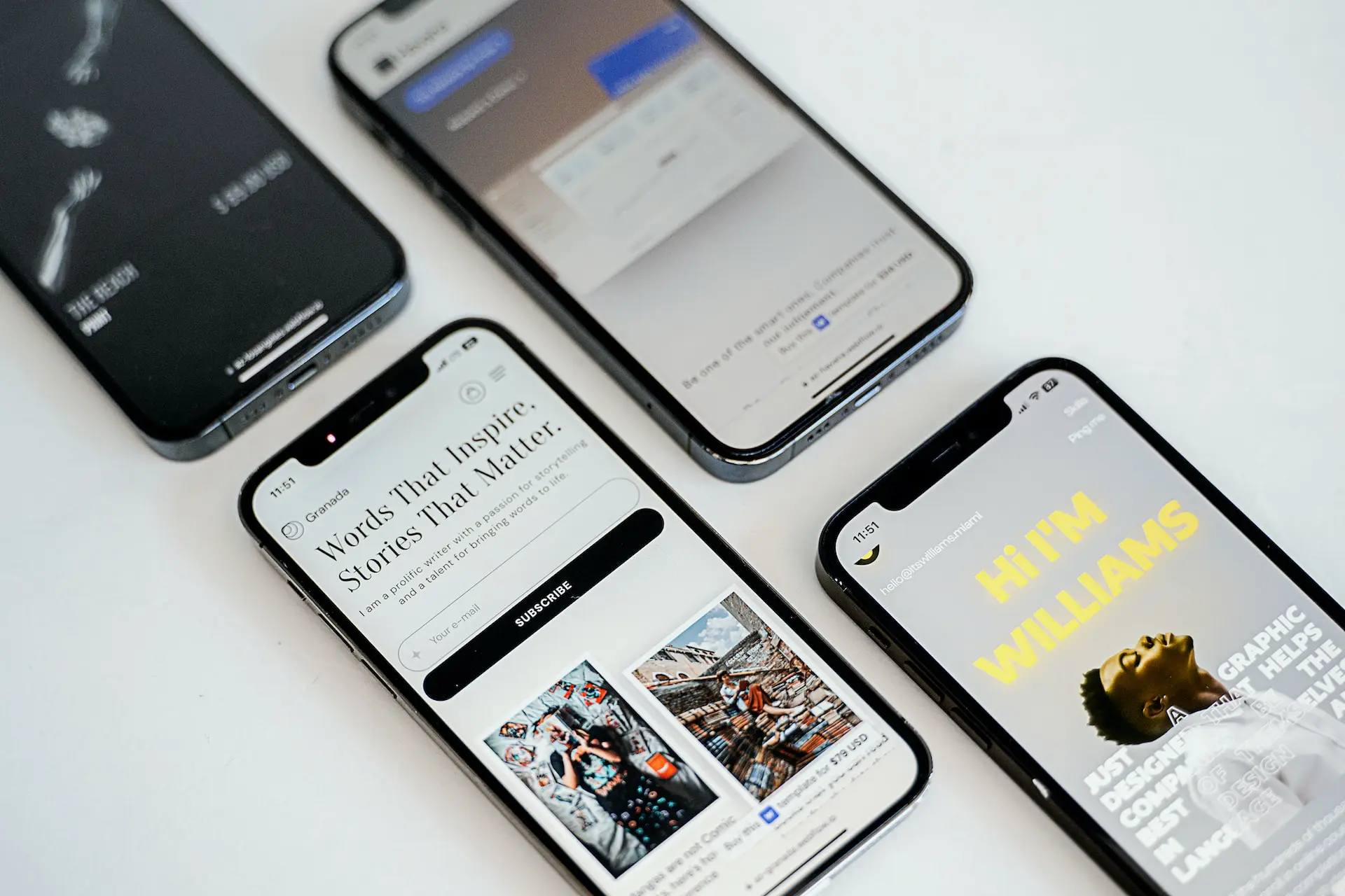 4 iphones sitting next to each other