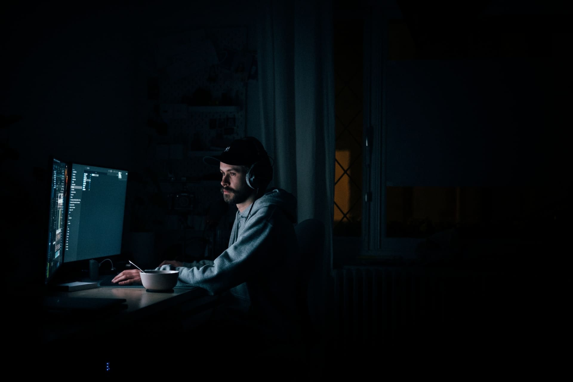 a developer coding in dark room